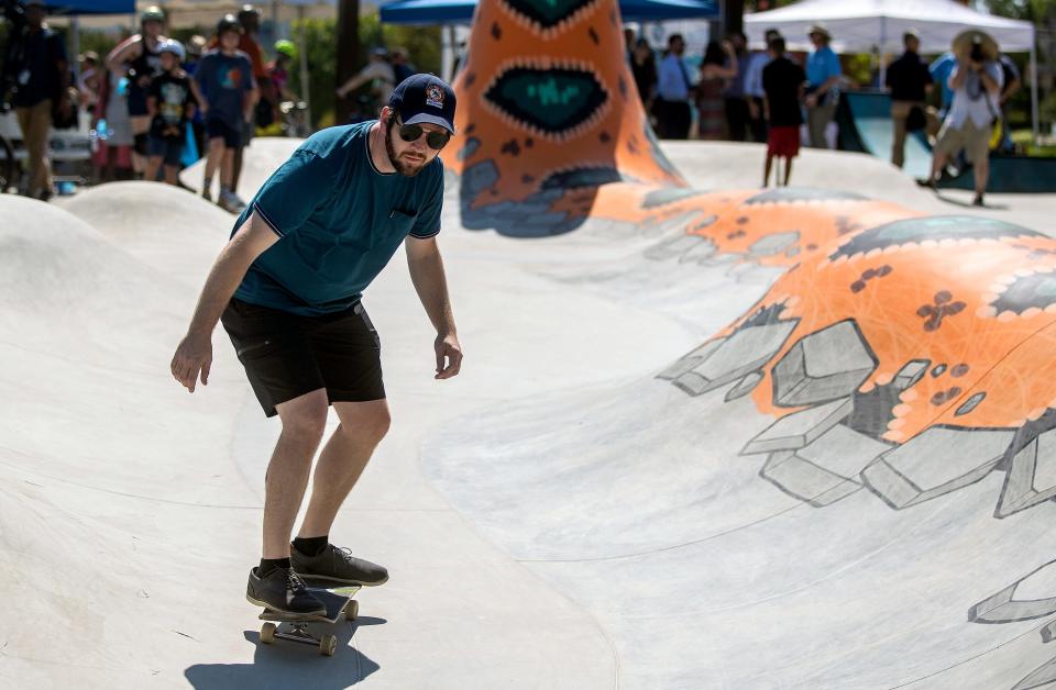 City Commissioner Jeremy Matlow skates in the new Cascades Trail Skateable Art Park after its grand opening on Wednesday, June 22, 2022 in Tallahassee, Fla.