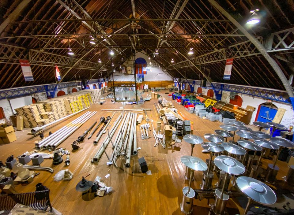 What was once the basketball court at the Bank Street Armory in Fall River is now the city's basement, used as storage for everything from Christmas decorations to streetlights.