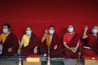 Buddhist monks perform rituals during the funeral of veteran Nepalese Sherpa guide Ang Rita, at Sherpa Monastery in Kathmandu, Nepal, Wednesday, Sept. 23, 2020. Ang Rita, who was the first person to climb Mount Everest 10 times has died Monday at age 72 after a long illness. (AP Photo/Niranjan Shrestha)