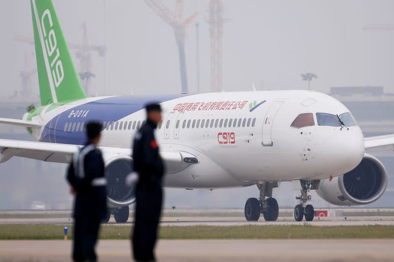 FILE PHOTO: China's home-grown C919 passenger jet taxis after landing on its maiden flight at the Pudong International Airport in Shanghai