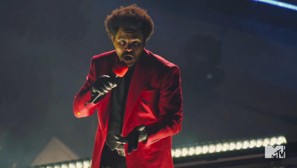 In this video grab issued Sunday, Aug. 30, 2020, by MTV, The Weeknd performs "Blinding Lights" during the MTV Video Music Awards. (MTV via AP)