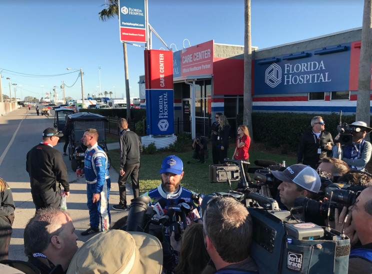 Jimmie Johnson speaks outside the Daytona infield care center. (Photo via Yahoo Sports)