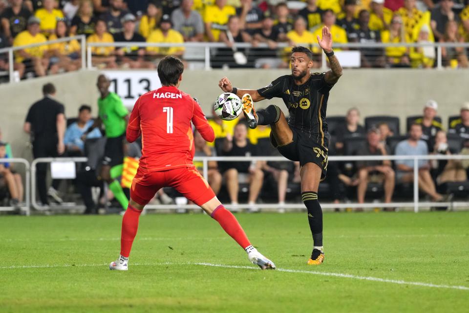 COLUMBUS, OHIO - AUGUST 25: Denis Bouanga #99 of Los Angeles FC shoots on Nicholas Hagen #1 of the Columbus Crew during the second half of the Leagues Cup 2024 Fin at Lower.com Field on August 25, 2024 in Columbus, Ohio. (Photo by Jason Mowry/Getty Images)