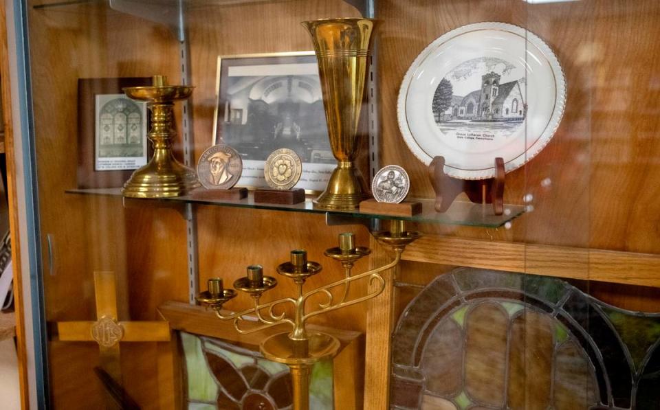 Items from the original Grace Lutheran Church are on display in the library of its current location on Beaver Avenue and Garner Street.