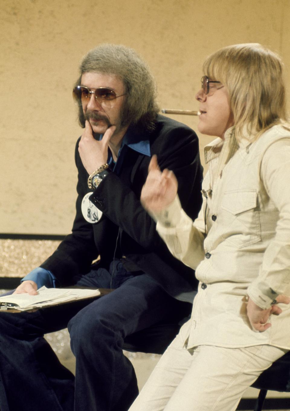 SATURDAY EVENING POST -- Aired 12/14/74 -- Pictured: (l-r) Record producer Phil Spector and singer/actor Paul Williams -- Photo by: NBCU Photo Bank