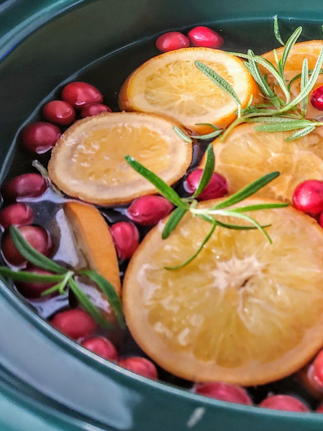 Cranberries, cinnamon, cloves, rosemary, oranges and nutmeg.