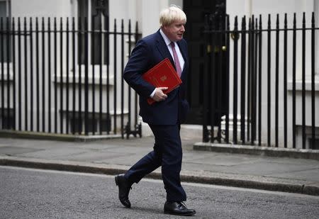 Britain's Foreign Secretary Boris Johnson walks along Downing Street in London, Britain October 24, 2016. REUTERS/Dylan Martinez