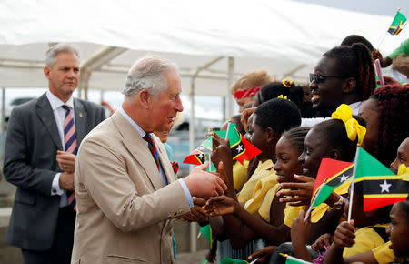 Britain's Prince Charles and Camilla, Duchess of Cornwall are welcomed to Nevis during their visit to St Kitts and Nevis, March 21, 2019. REUTERS/Phil Noble