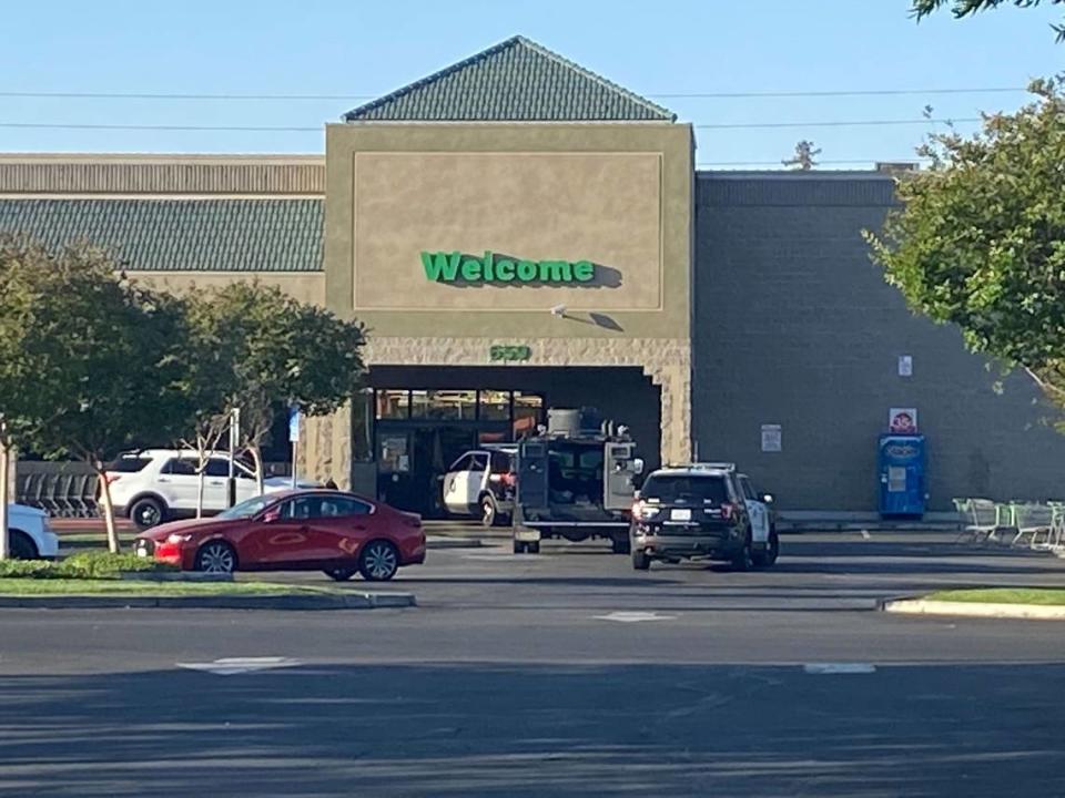 Fresno police at the scene of a standoff with a suspect barricaded inside the Save Mart grocery store near First Street and Nees Avenue on Friday morning, May 20.