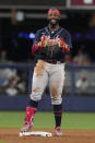 Atlanta Braves' Michael Harris II gestures to the team after hitting a double during the eighth inning of a baseball game against the Miami Marlins, Tuesday, May 2, 2023, in Miami. The Braves defeated the Marlins 6-0. (AP Photo/Marta Lavandier)