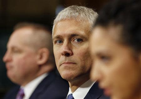 Chief Information Officer at Neiman Marcus Michael Kingston listens while he testifies at the Senate Judiciary Committee hearing about Privacy in the Digital Age on Capitol Hill in Washington, February 4, 2014. REUTERS/Larry Downing