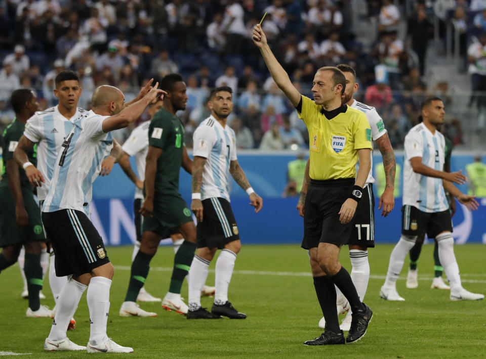 <p>Mascherano is booked for his foul which lead to Nigeria’s penalty </p>