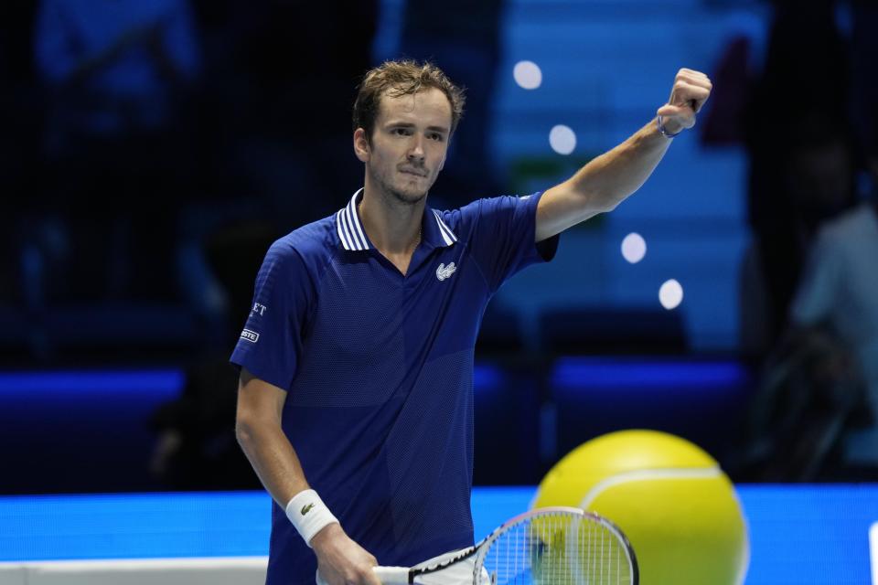 Russia's Daniil Medvedev celebrates after defeating Italy's Jannik Sinner during their ATP World Tour Finals singles tennis match, at the Pala Alpitour in Turin, Thursday, Nov. 18, 2021. (AP Photo/Luca Bruno)