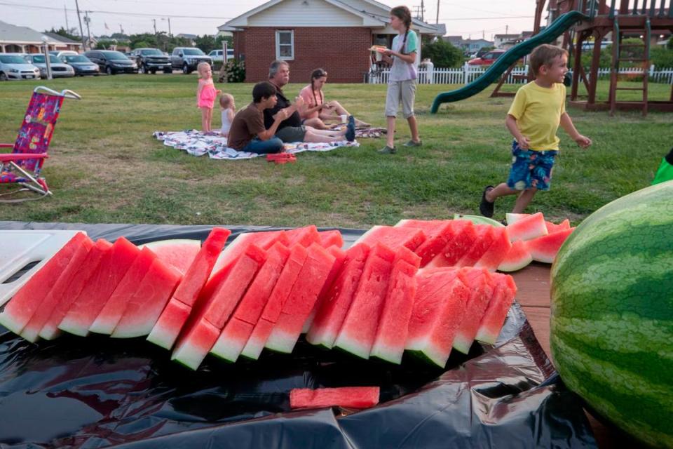 Guest enjoy the weekly ‘Hot Dog Cook Out’ at The Cavalier By The Sea Motel on Wednesday, July 21, 2021 in Kill Devil Hills, N.C.