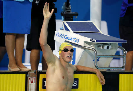 Swimming - Gold Coast 2018 Commonwealth Games - Men's 400m Freestyle Final - Optus Aquatic Centre - Gold Coast, Australia - April 5, 2018. Mack Horton of Australia celebrates after winning a gold medal. REUTERS/David Gray