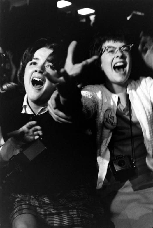 Not published in LIFE. Fans at the first Beatles concert in America, Washington, DC, Feb. 11, 1964. (Stan Wayman—Time & Life Pictures/Getty Images) <br> <br> <a href="http://life.time.com/culture/the-beatles-rare-early-photos-of-beatlemania-in-1964/#1" rel="nofollow noopener" target="_blank" data-ylk="slk:Click here to see the full collection at LIFE.com;elm:context_link;itc:0;sec:content-canvas" class="link ">Click here to see the full collection at LIFE.com</a>