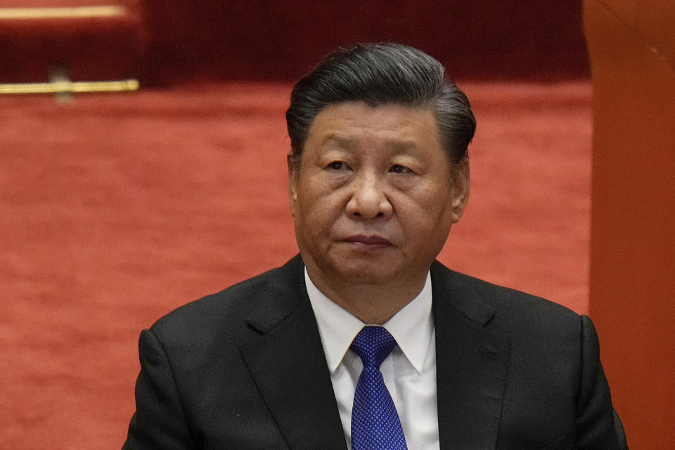 Chinese President Xi Jinping attends an event commemorating the 110th anniversary of Xinhai Revolution at the Great Hall of the People in Beijing on Oct. 9, 2021. Xi appears to be laying the foundation for a third term as the all-powerful Communist Party meets in Beijing. The official Xinhua News Agency said president and party General Secretary Xi issued a a draft resolution on the party's "major achievements and historical experience" at the Central Committee's plenary session that opened on Monday, Nov. 8. (AP Photo/Andy Wong)