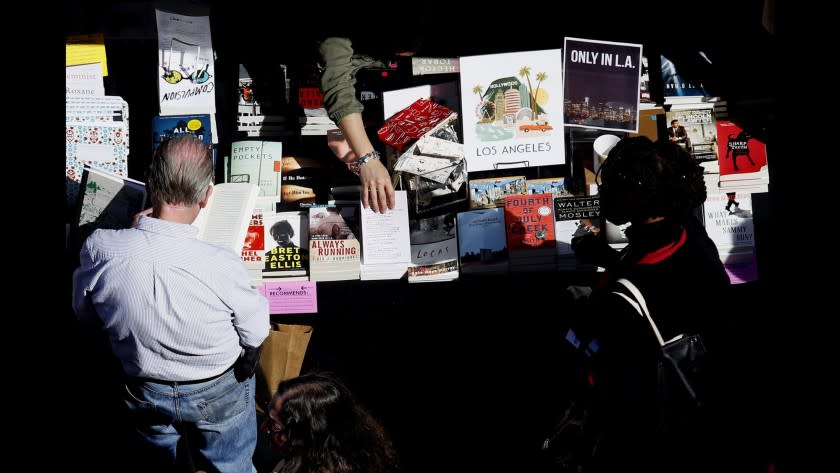 People browse books for sale at the Los Angeles Times Festival of Books at USC on April 19.