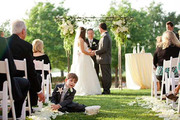 <div class="caption-credit">Photo by: Jennefer Wilson Photography</div><div class="caption-title">Rolling In The Aisles</div><p> As hard as they may try, tots just can't sit through an entire wedding, but we give them a gold star for effort. </p> <p> <i>Have a photobomb of your own that you'd like to share? Upload your pic to</i> <i><span>BG's Facebook page</span> or</i><i><span>submit it to us via Instagram</span> (be sure to include the hashtag #bgphotobombs) and we may add it to our list!</i> </p>