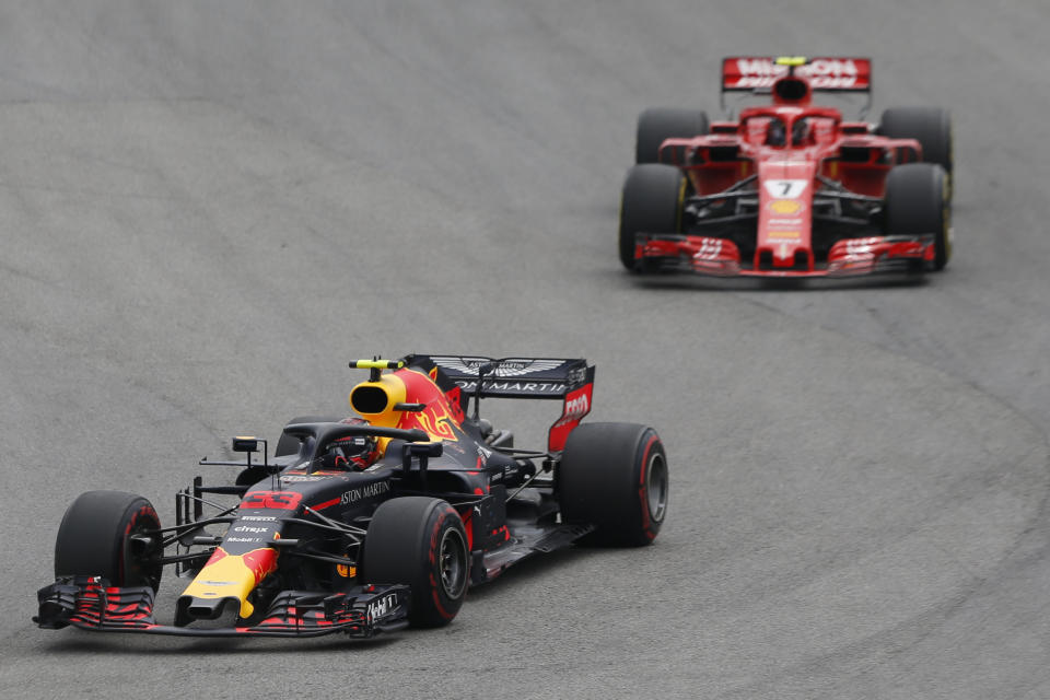 Red Bull driver Max Verstappen, of Netherlands, steers his car followed by Ferrari driver Kimi Raikkonen, of Finland, during Brazilian Formula One Grand Prix at the Interlagos race track in Sao Paulo, Brazil, Sunday, Nov. 11, 2018. (AP Photo/Nelson Antoine)