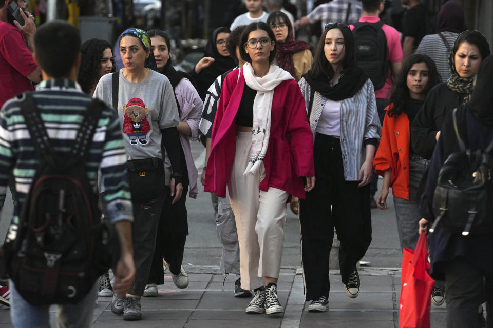 Iran's parliament on Wednesday, Sept. 20, 2023, approved a bill to impose heavier penalties on women who refuse to wear the mandatory Islamic headscarf in public and those who support them (Vahid Salemi / AP)