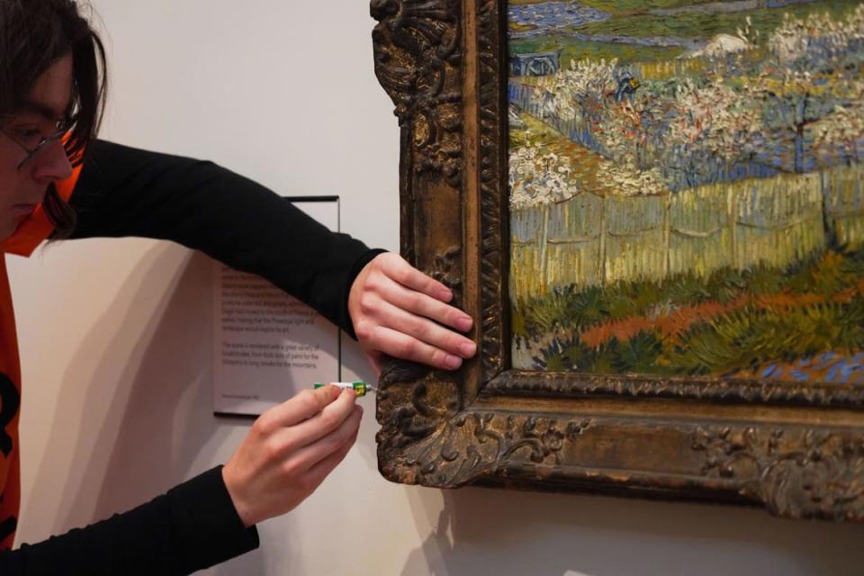 <div class="inline-image__caption"><p>Just Stop Oil climate activists glue themselves to a Van Gogh painting at the Courtauld Gallery, London, on June 30, 2022.</p></div> <div class="inline-image__credit">Photo by Kristian Buus/In Pictures via Getty Images</div>