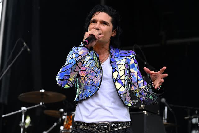 <p>Daniel Boczarski/Getty</p> Corey Feldman performs during Riot Fest 2023 in Chicago