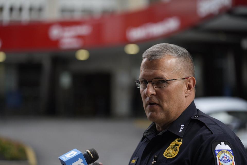 Assistant Columbus Police Chief Greg Bodker updates news media Friday, July 7, 2023, outside of OhioHealth Grant Medical Center in downtown Columbus after visiting a police officer who was critically wounded Thursday during a shootout with three suspects on Interstate 70 near West Mound Street. One suspect was killed.