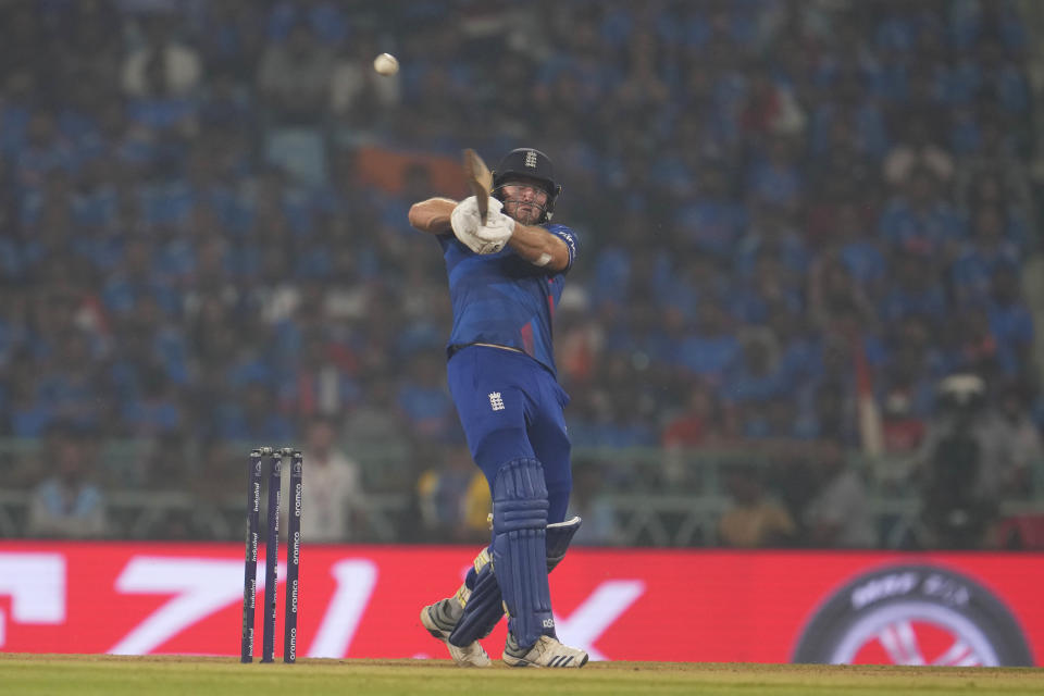 England's David Willey plays a shot during the ICC Men's Cricket World Cup match between India and England in Lucknow, India, Sunday, Oct. 29, 2023. (AP Photo/Manish Swarup)