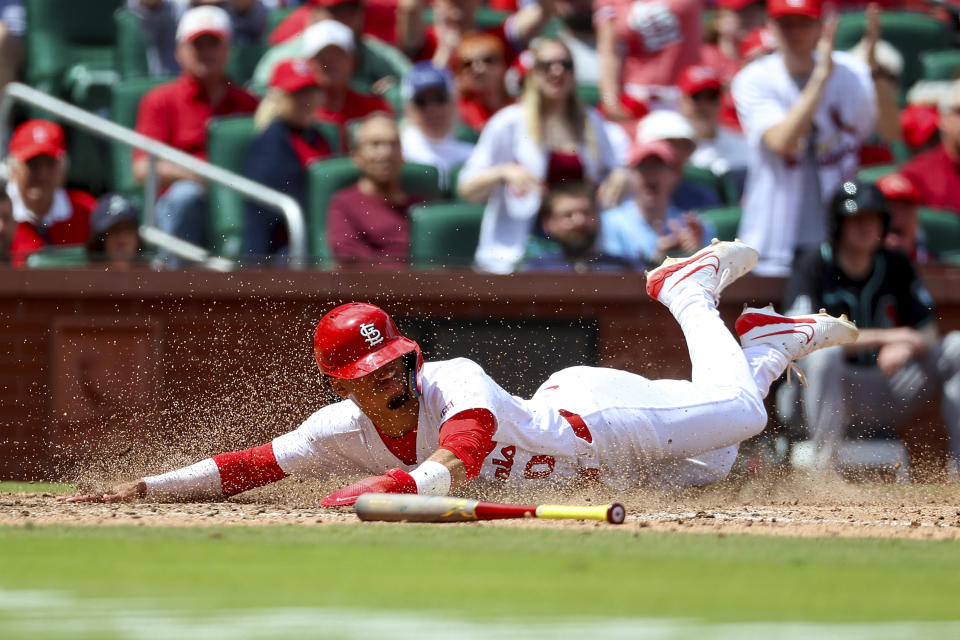 St. Louis Cardinals' Masyn Winn scores a run during the seventh inning of a baseball game against the Arizona Diamondbacks, Wednesday, April 24, 2024, in St. Louis. (AP Photo/Scott Kane)