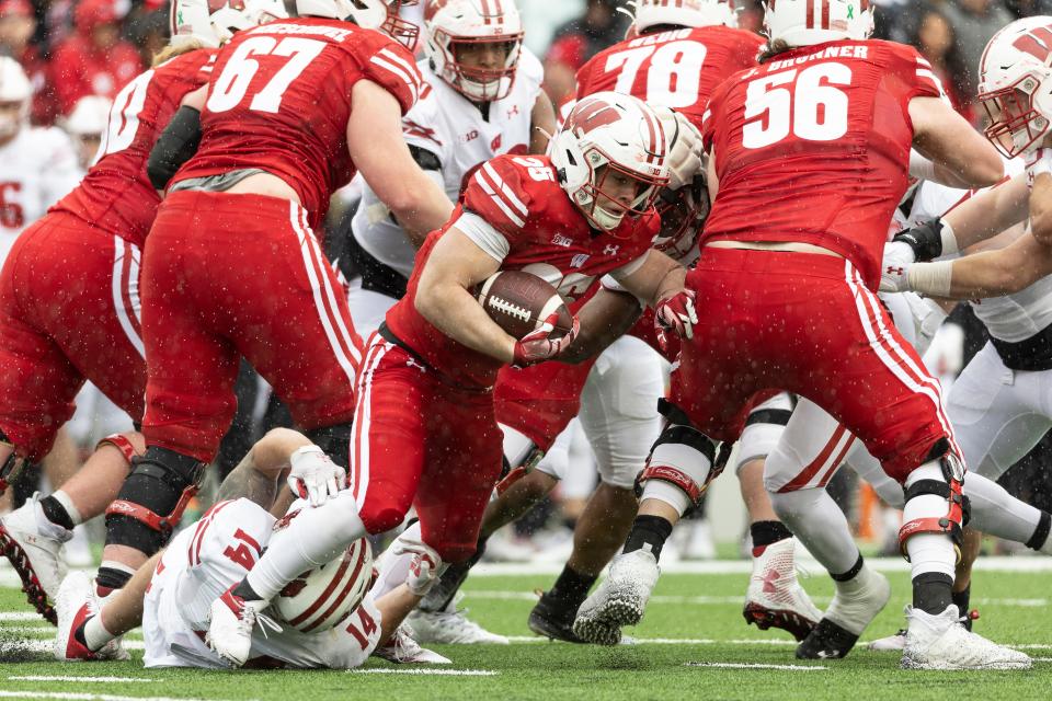 Wisconsin Badgers running back Cade Yacamelli (25) carries the ball during the spring football game at Camp Randall Stadium, Saturday, April 22, 2023, in Madison, Wis. (Photo by David Stluka/UW Athletic Communications)