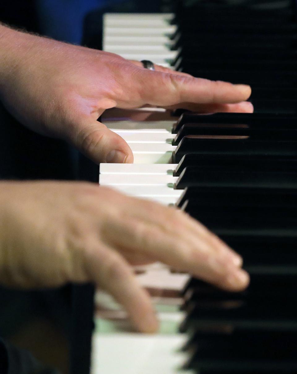 Bradley Wyner, music director for Western Reserve Playhouse's production of "Jekyll & Hyde," warms up before a rehearsal Tuesday, Aug. 1, 2023, in Bath, Ohio.