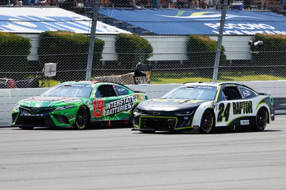 LONG POND, PA - JULY 23:  William Byron (#24 RaptorTough.com Hendrick Motorsports Chevrolet) and Martin Truex, Jr (#19 Interstate Batteries Joe Gibbs Racing Toyota) during the NASCAR Cup Series Highpoint 400 on July 23, 2023 at Pocono Raceway in Long Pond, Pennsylvania.  (Photo by Rich Graessle/Icon Sportswire via Getty Images)