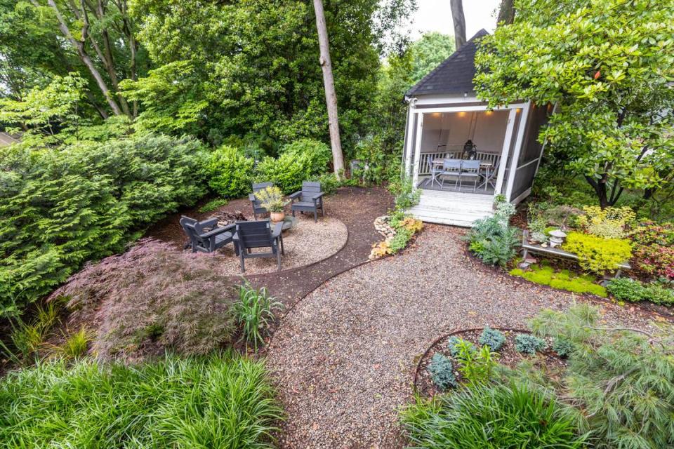 The backyard has plenty of space for seating and a gazebo for outdoor dining.