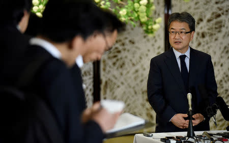 FILE PHOTO: U.S. Special Representative for North Korea Policy Joseph Yun (R) answers questions from reporters following meeting with Japan and South Korea chief nuclear negotiators to talk about North Korean issues at the Iikura guest house in Tokyo, Japan April 25, 2017. REUTERS/Toru Yamanaka/Pool/File Photo