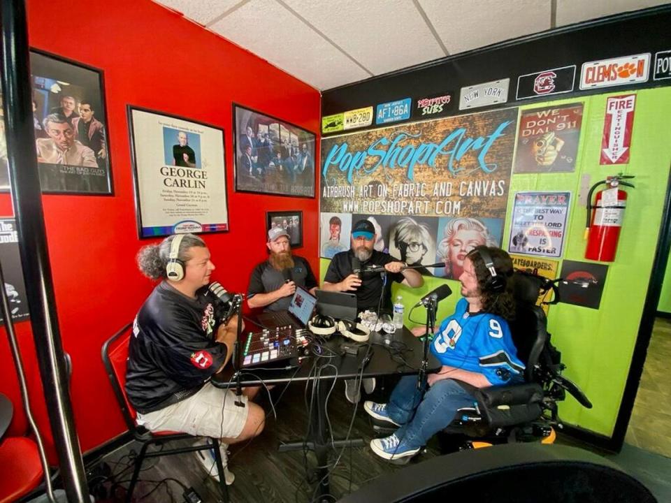 The Carolina Cat Chronicles podcast records live from Monster Subs and Grub in Spartanburg during Carolina Panthers 2023 training camp. From left to right: Tony Dunn, Greg Schlager, Cody Kelly, Cody Lachney.