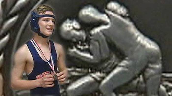 Wakeland wrestler Alex Chappell superimposed in front of his silver medal — Facebook