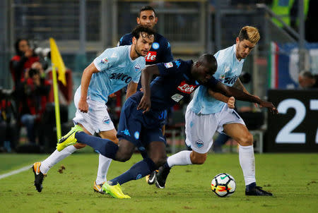 Soccer Football - Serie A - Lazio vs Napoli - Stadio Olimpico, Rome, Italy - September 20, 2017 Lazio’s Luis Alberto in action with Napoli's Kalidou Koulibaly REUTERS/Ciro De Luca