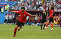 <p>South Korea’s Kim Young-gwon celebrates scoring his side’s first goal </p>