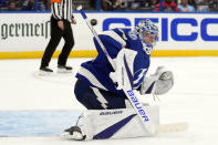 Tampa Bay Lightning goaltender Andrei Vasilevskiy (88) makes a stick save on a shot by the Florida Panthers during the third period in Game 4 of an NHL hockey Stanley Cup first-round playoff series, Saturday, April 27, 2024, in Tampa, Fla. (AP Photo/Chris O'Meara)