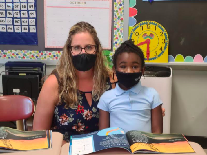 Nonso Anaedozie and her third-grade teacher, Anne Farcosky. (Jessica Baker)