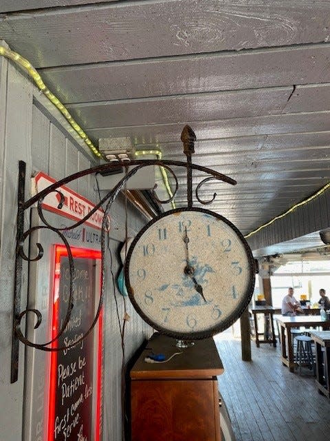 This is the clock inside Bonita Bill's on Fort Myers Beach. It is always set to 5 o'clock.