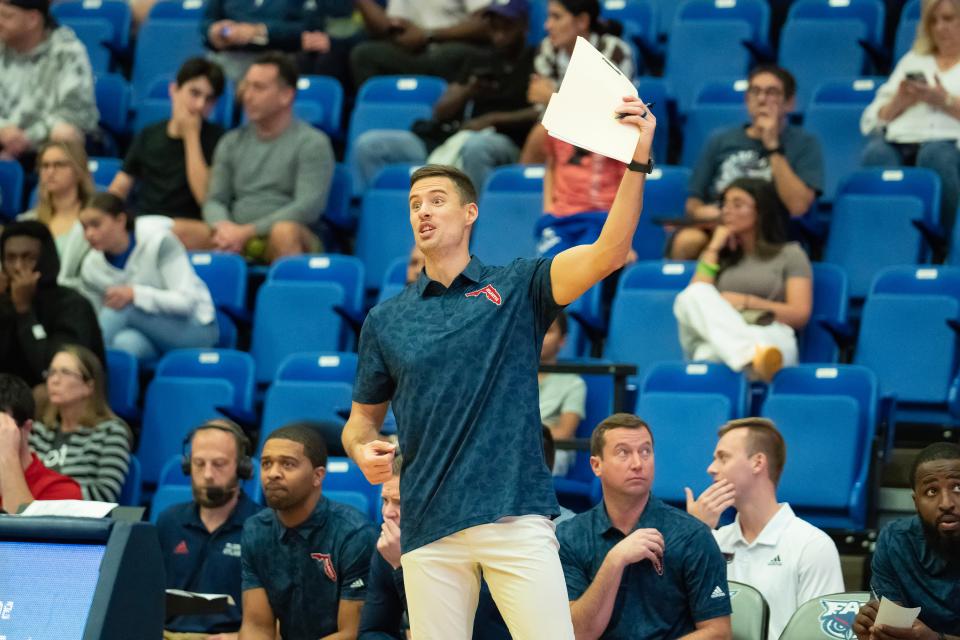 Todd Abernethy, assistant coach at Florida Atlantic University is the son of Tom Abernethy, starting forward for the 1976 Indiana Hoosiers, college basketball’s last undefeated men’s champions. He's seen here during the 2023 FAU men's basketball game vs Lynn University.
