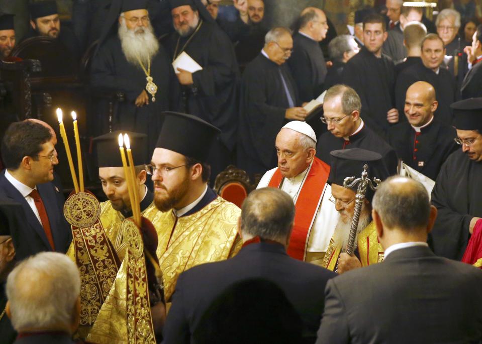 Pope Francis and Ecumenical Patriarch Bartholomew I of Constantinople, leave after an Ecumenical Prayer at the Patriarchal Church of Saint George in Istanbul November 29, 2014. (REUTERS/Umit Bektas)