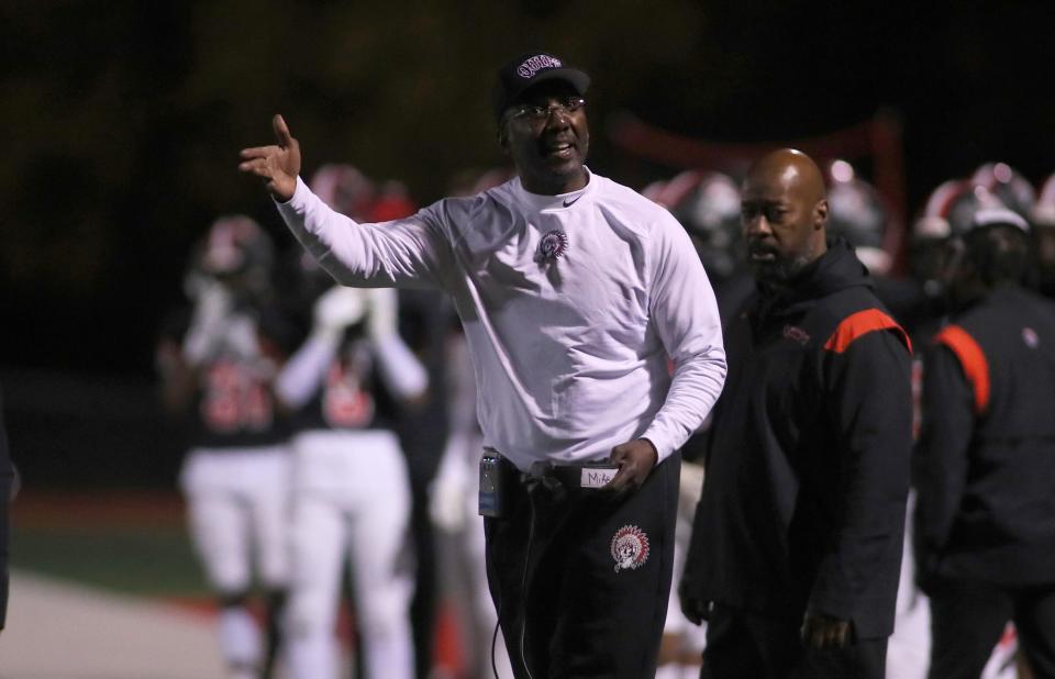 Aliquippa Head Coach Mike Warfield reacts after a flag was thrown against Aliquippa in the first half of the game against the New Castle Canes Friday night at Jimbo Covert Field in Freedom, PA.