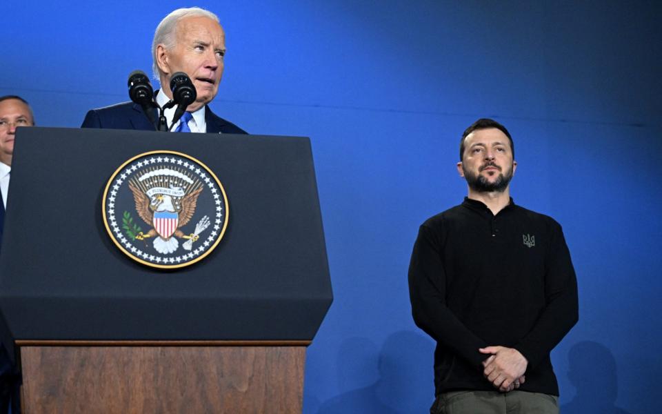 US President Joe Biden speaks alongside Ukraine's President Volodymyr Zelensky on the sidelines of the Nato summit