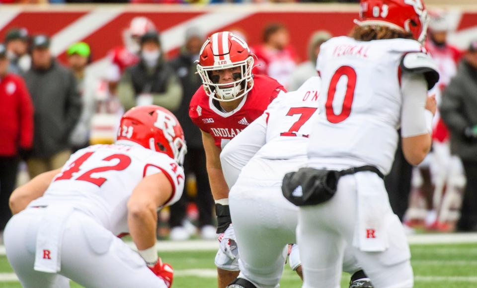 Indiana's Micah McFadden (47) eyes Rutgers' Noah Vedral (0) during the first half of the Indiana versus Rutgers football game at Memorial Stadium on Saturday, Nov. 13, 2021.