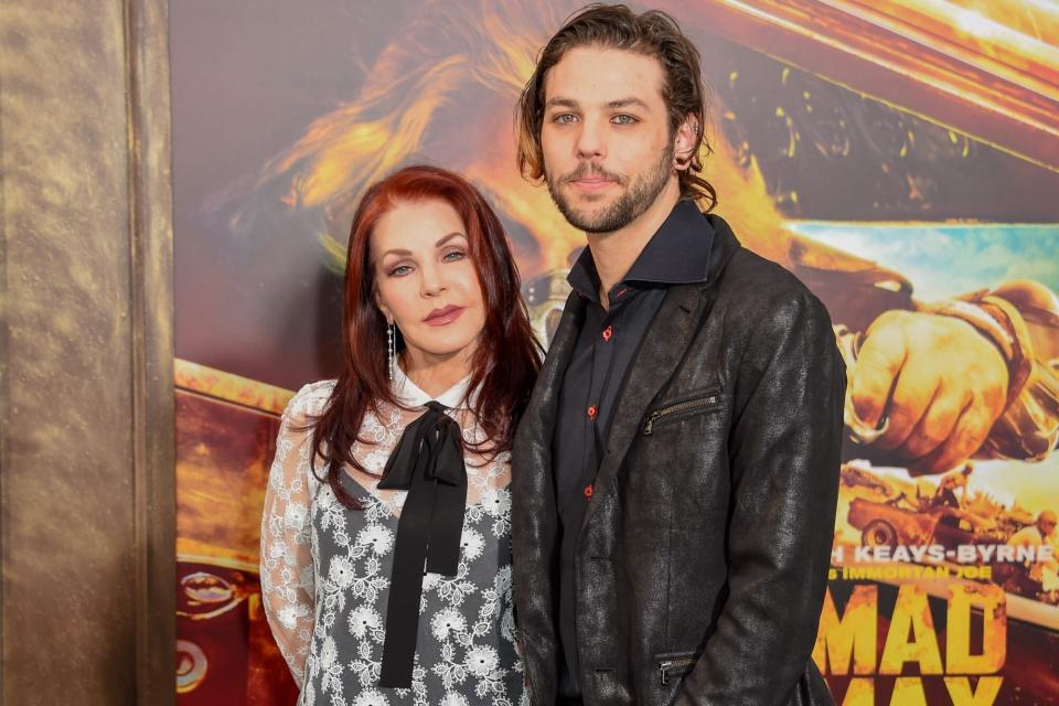 Mandatory Credit: Photo by Rob Latour/Shutterstock (4760817bc) Priscilla Presley and Navarone Garibaldi 'Mad Max: Fury Road' film premiere, Los Angeles, America - 07 May 2015