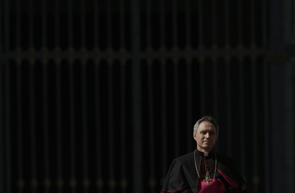 FILE - Pope Benedict XVI's personal secretary Archbishop Georg Gaenswein attends pope's general audience in St. Peter's Square at the Vatican, Wednesday, Feb. 27, 2013. Pope Francis met on Monday, Jan. 9, 2023, with Archbishop Gaenswein, the longtime secretary of Pope Benedict XVI who was a key figure in his recent funeral but who has raised eyebrows with an extraordinary memoir in which he settles old scores and reveals palace intrigue. (AP Photo/Gregorio Borgia, File)