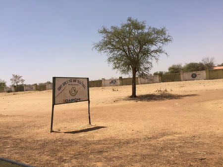 A signpost of the Government Girls Science and Technical College is pictured in Dapchi in the northeastern state of Yobe, Nigeria March 3, 2018. Amnesty International/Handout via REUTERS